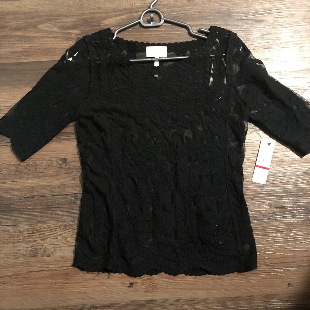 New black blouse (retails $69)